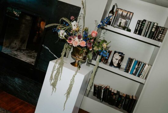 Intimate wedding ceremony in the library at Common House Richmond surrounded by close family and friends